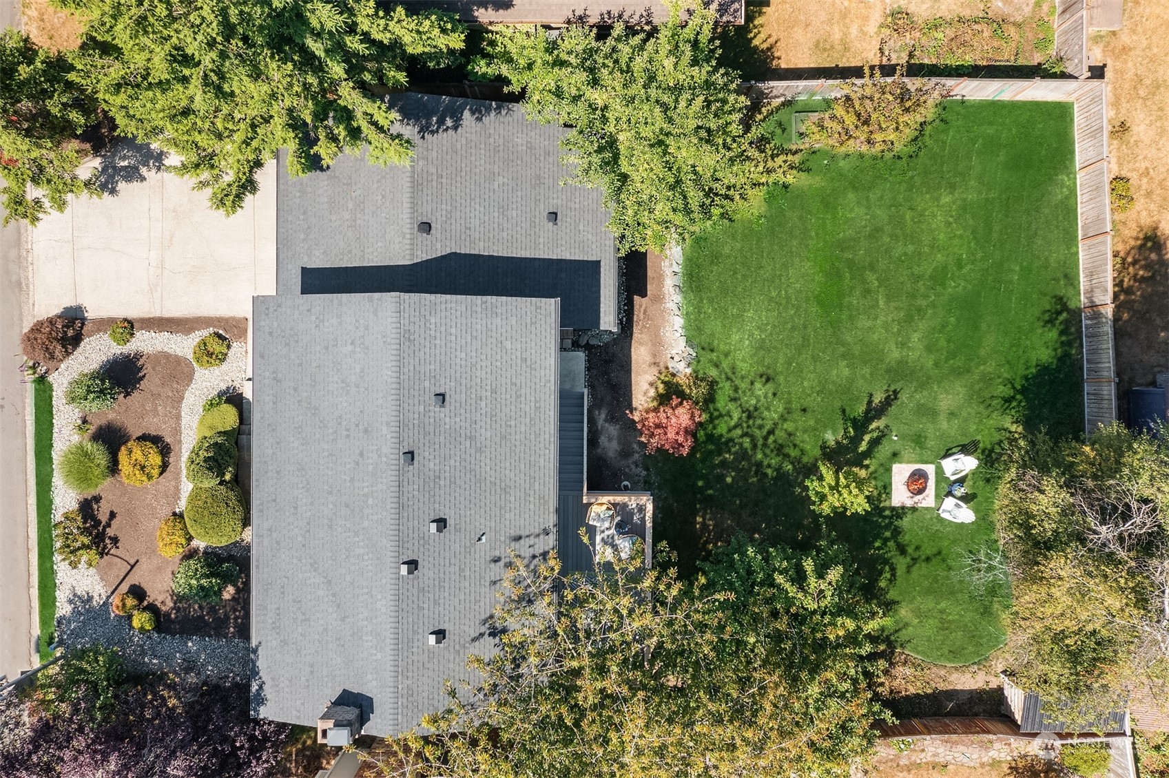 209 225th Place Southwest Bothell, WA 98021 - Photo 3 of 29 an aerial view of a house with a yard