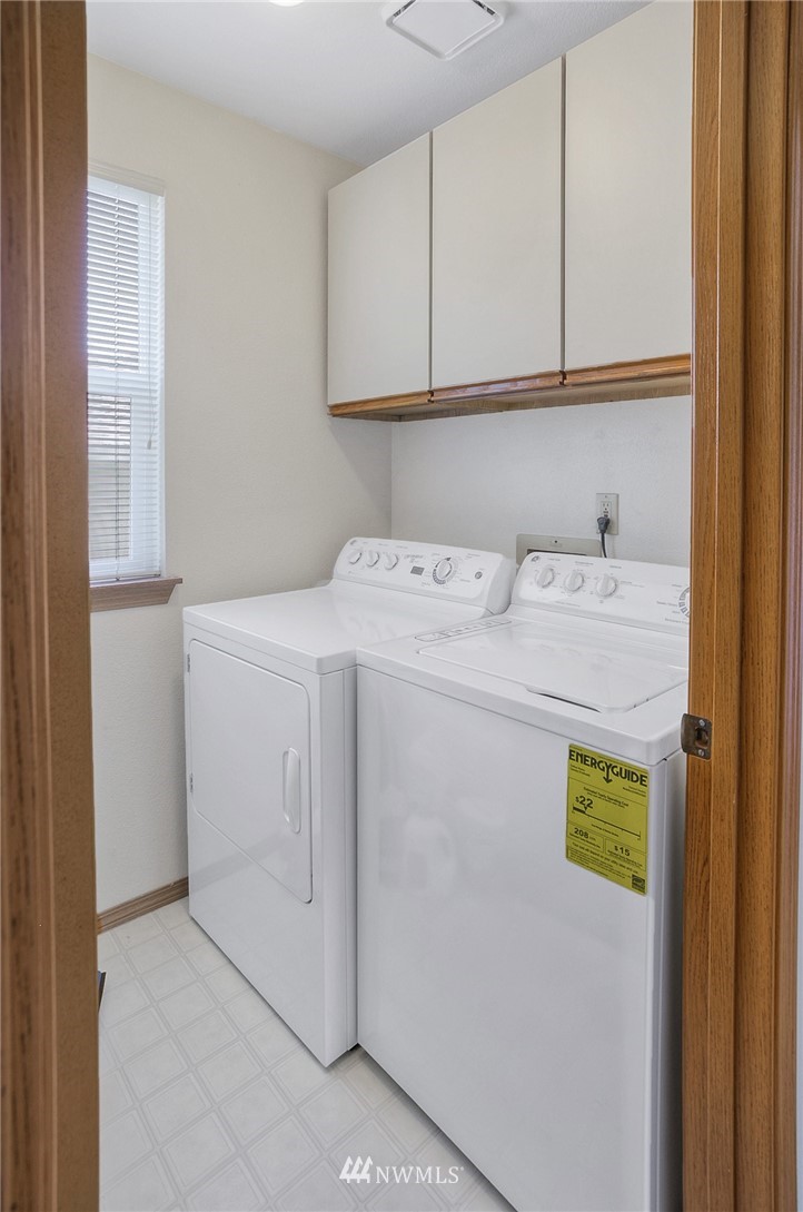 2124 Southeast 8th Drive Renton, WA 98057 - Photo 22 of 25 a utility room with dryer and washer