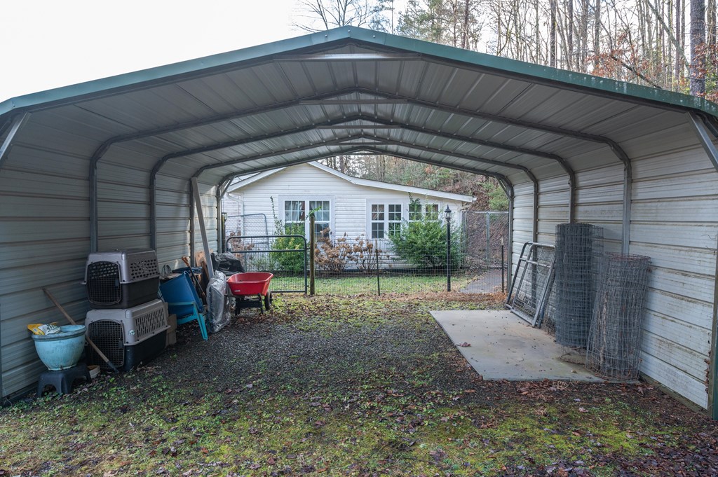 133 TJ Lane Murphy, NC 28906 - Photo 21 of 23 a view of a house with backyard and porch
