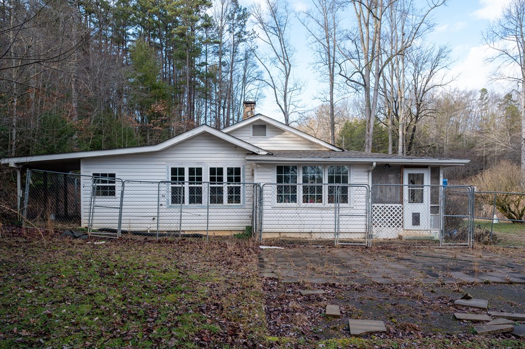 133 TJ Lane Murphy, NC 28906 - Photo 22 of 23 a front view of a house with yard