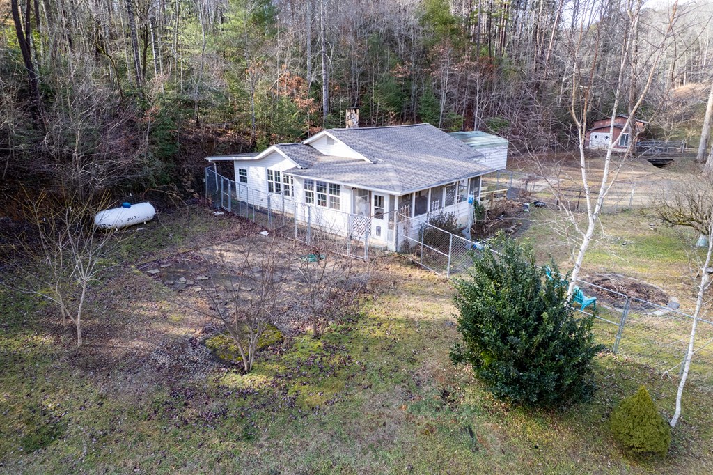 133 TJ Lane Murphy, NC 28906 - Photo 8 of 23 a view of a house with a backyard