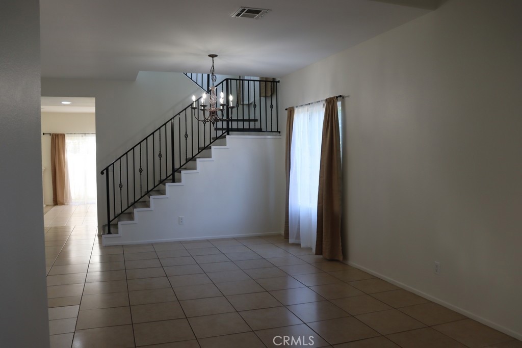 16731 Parthenia Street, Unit 3 Northridge, CA 91343 - Photo 15 of 37 a view of entryway and hall with wooden floor