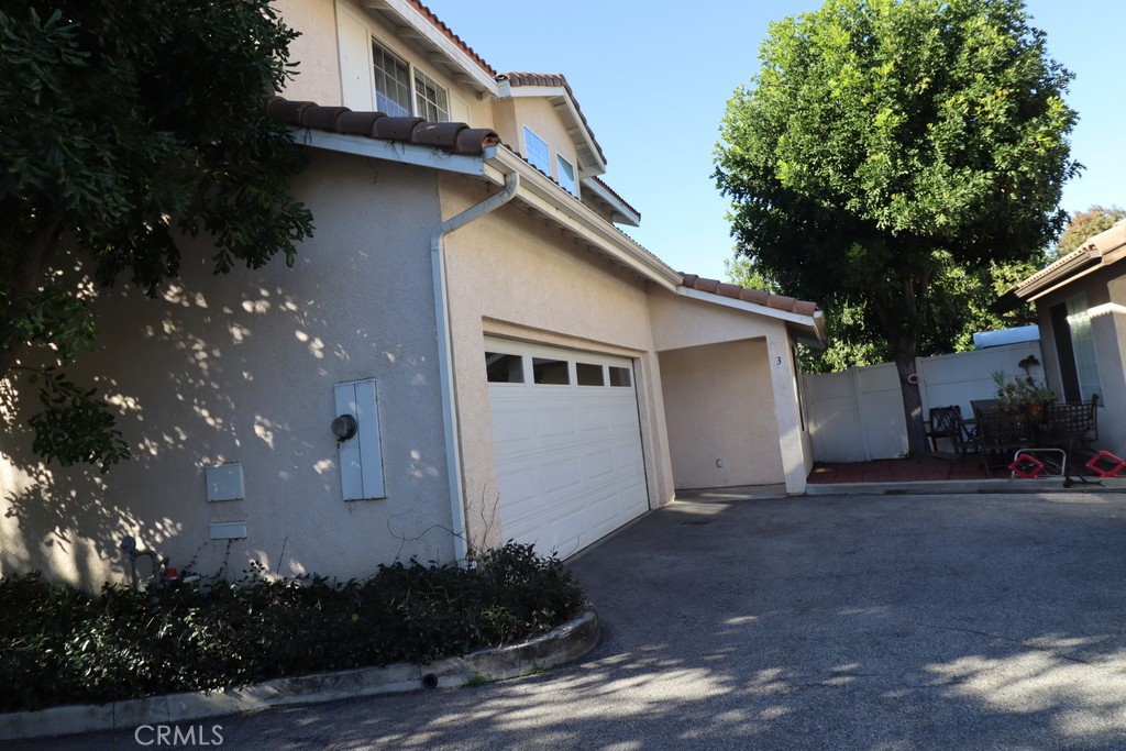 16731 Parthenia Street, Unit 3 Northridge, CA 91343 - Photo 9 of 37 a view of a house with a yard
