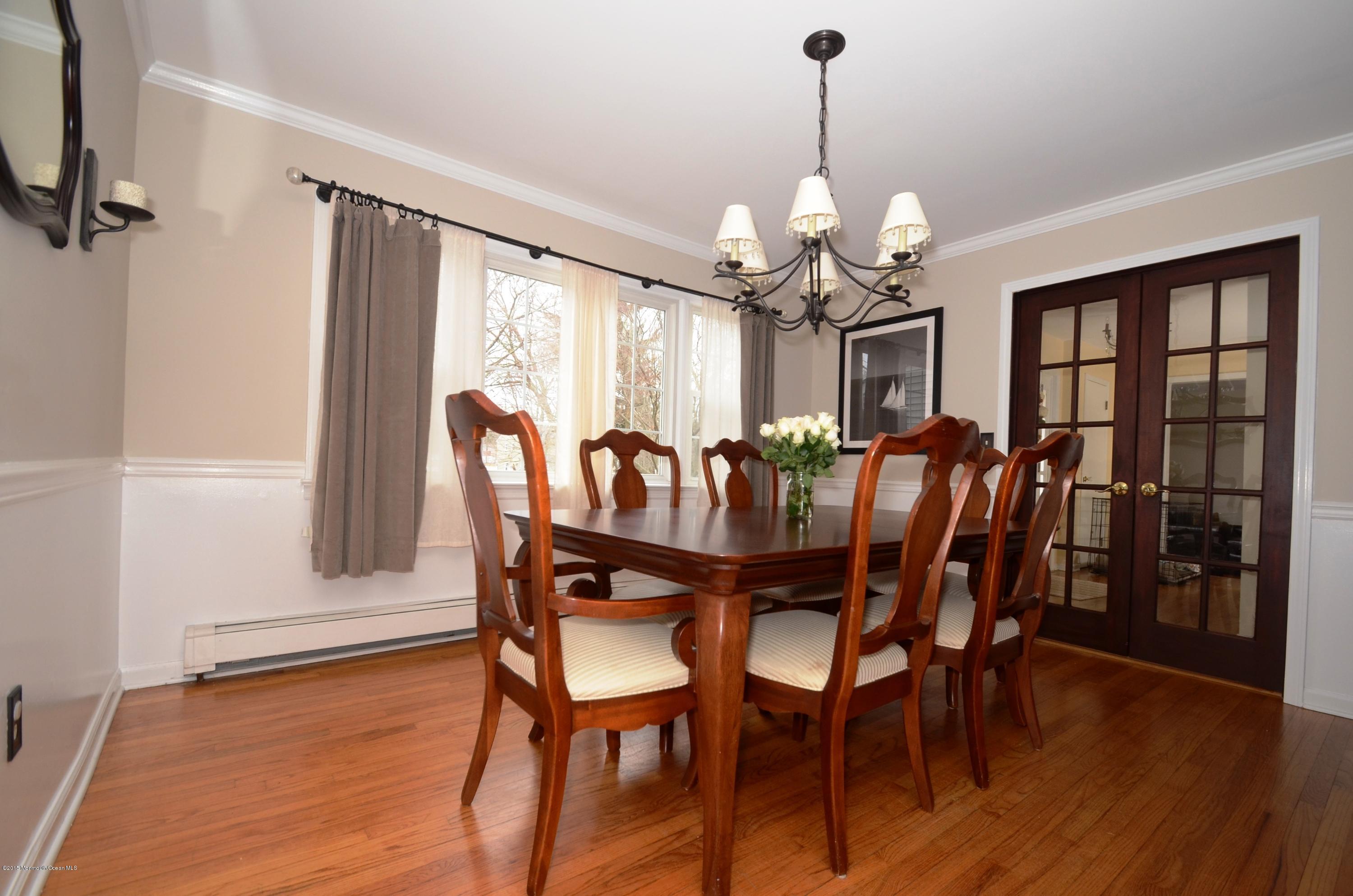 44 Farm Road Middletown, NJ 07748 - Photo 16 of 17 a view of a dining room with furniture window and wooden floor