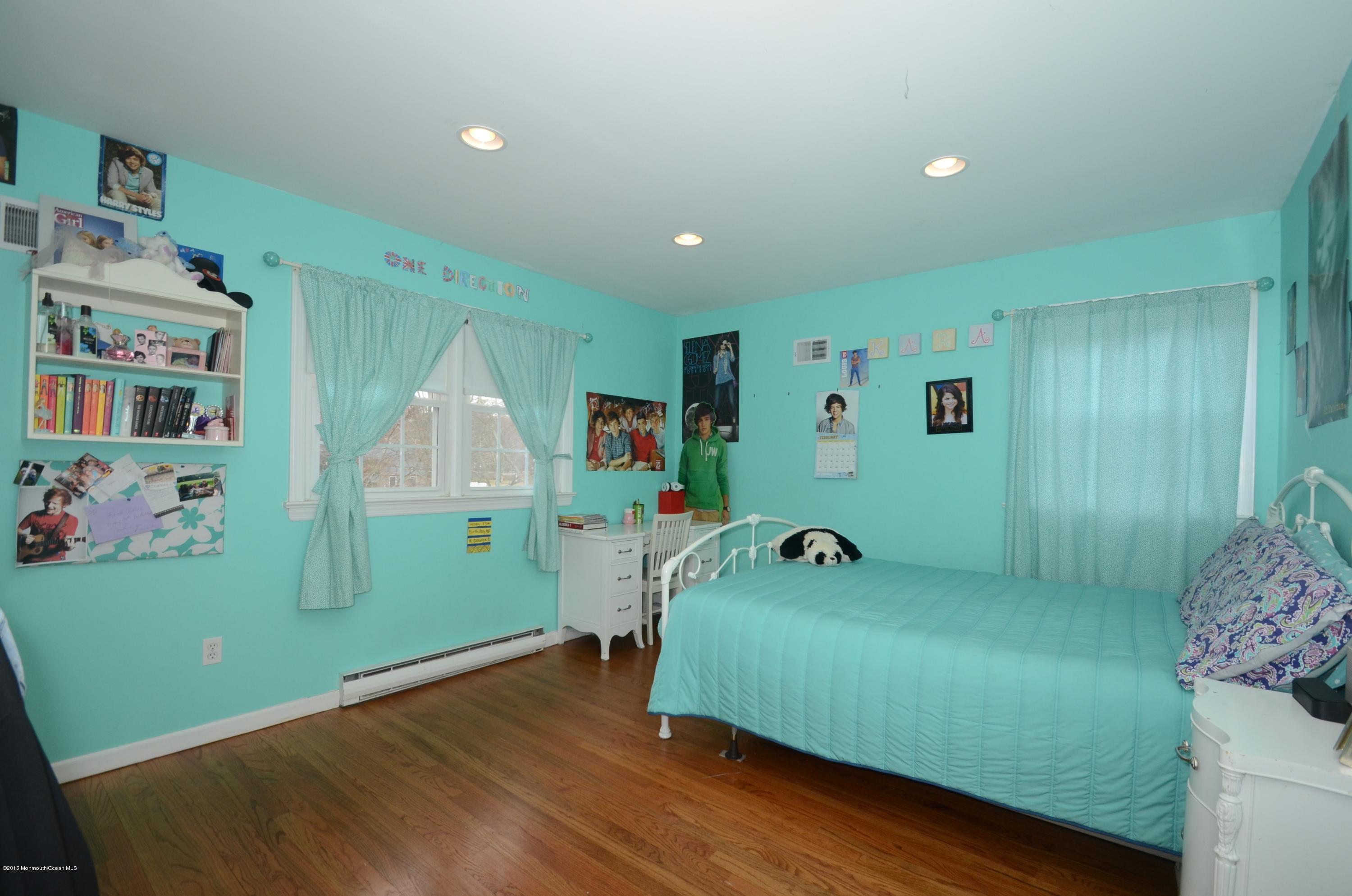 44 Farm Road Middletown, NJ 07748 - Photo 8 of 17 a room with games and windows