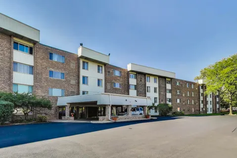 a front view of a building with street view