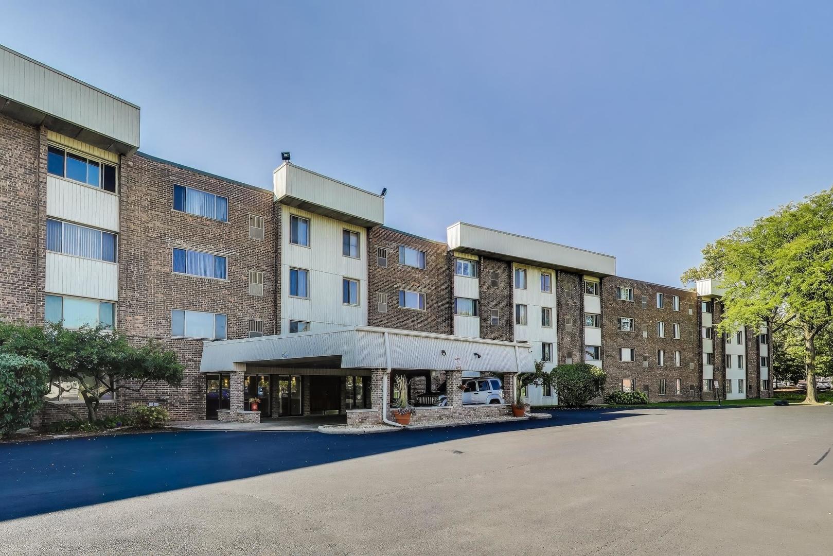 a front view of a building with street view