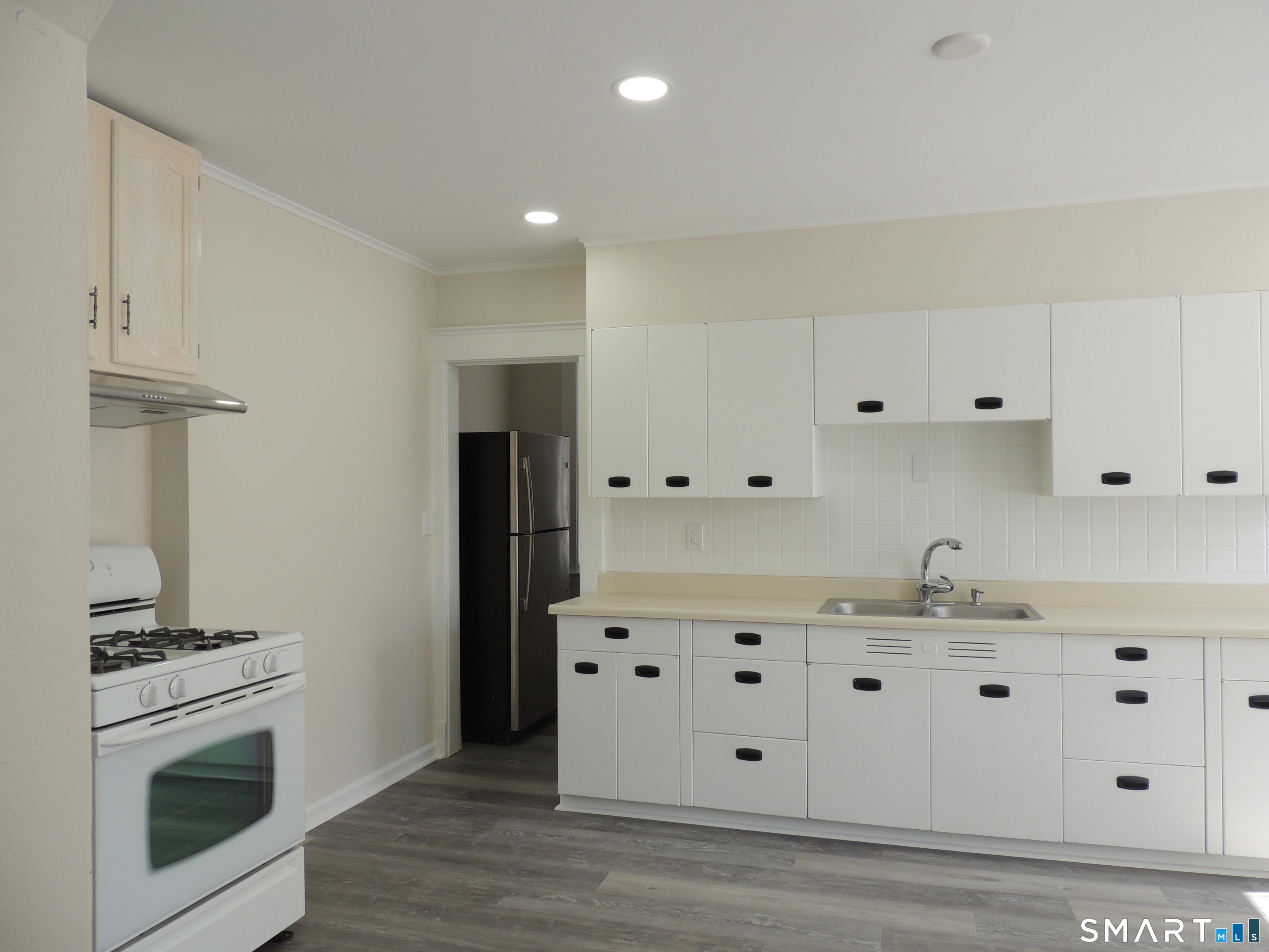 132 Silver Sands Road, Unit 1 East Haven, CT 06512 - Photo 8 of 20 Plenty of cabinet & work space