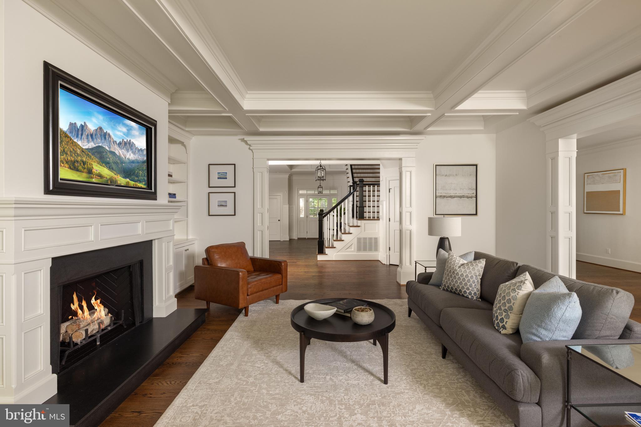 6719 Wemberly Way McLean, VA 22101 - Photo 11 of 50 Expansive family room with fireplace