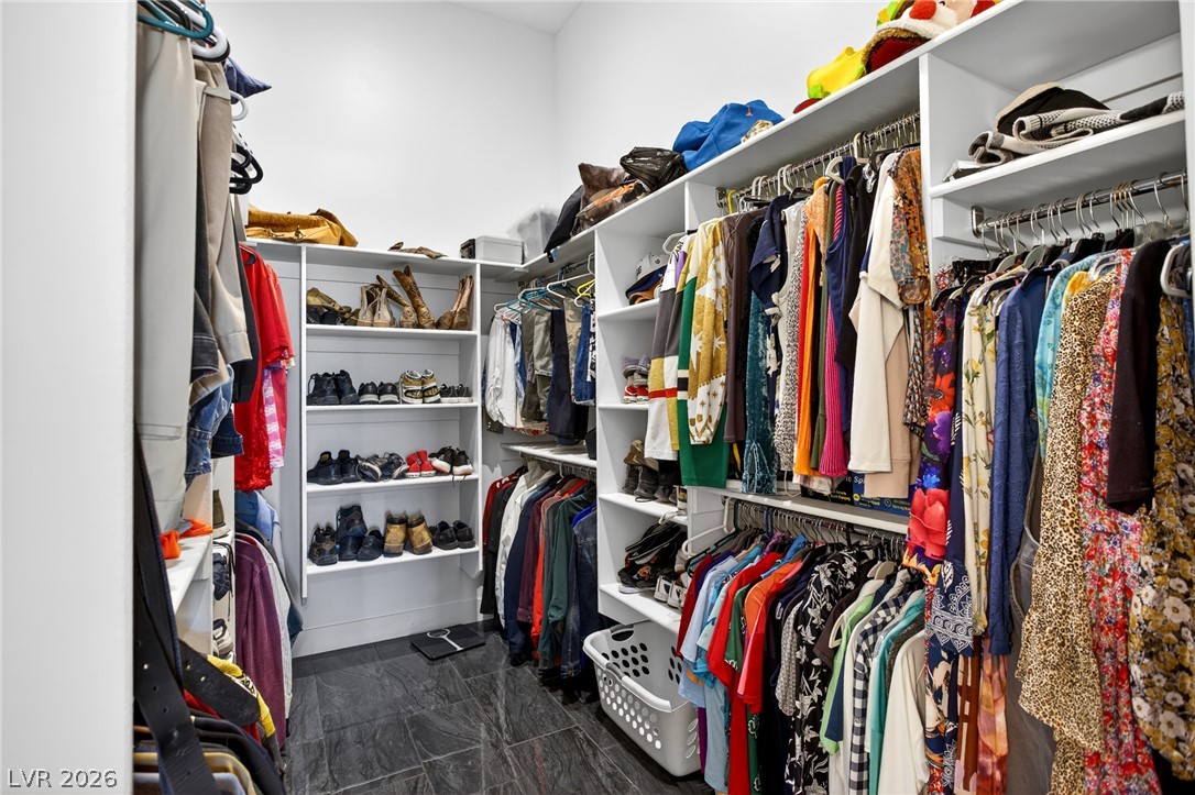1460 Blue Ridge Trail Mesquite, NV 89027 - Photo 22 of 39 Ample shelving and hanging space in this well-organized walk-in closet.