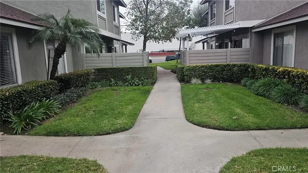 a view of a back yard of a house