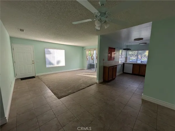a view of a windows and chandelier in a room