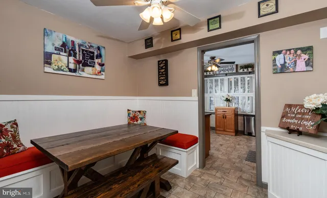 a room with furniture and a chandelier