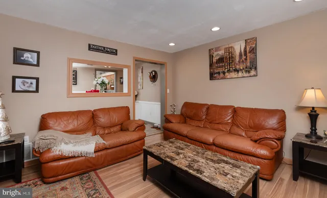 a living room with furniture and a couch