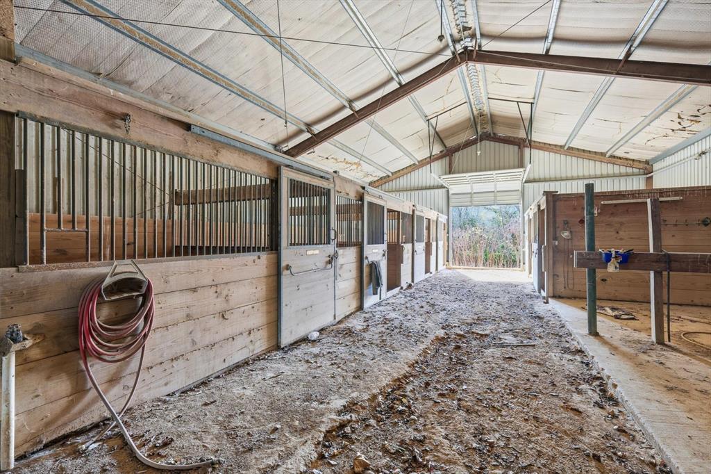 4640 Noell Road Van Alstyne, TX 75495 - Photo 17 of 34 a view of a porch with a wooden fence