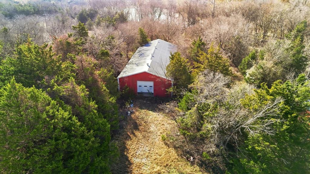 4640 Noell Road Van Alstyne, TX 75495 - Photo 19 of 34 a view of a back yard