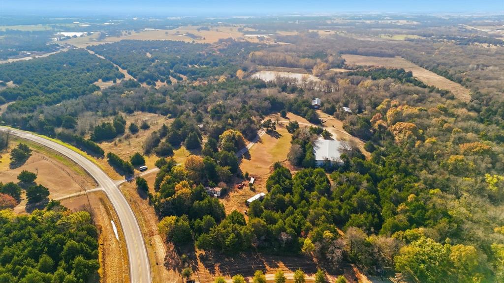 4640 Noell Road Van Alstyne, TX 75495 - Photo 20 of 34 an aerial view of lake and residential houses with outdoor space