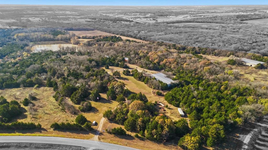 4640 Noell Road Van Alstyne, TX 75495 - Photo 28 of 34 an aerial view of residential houses with outdoor space