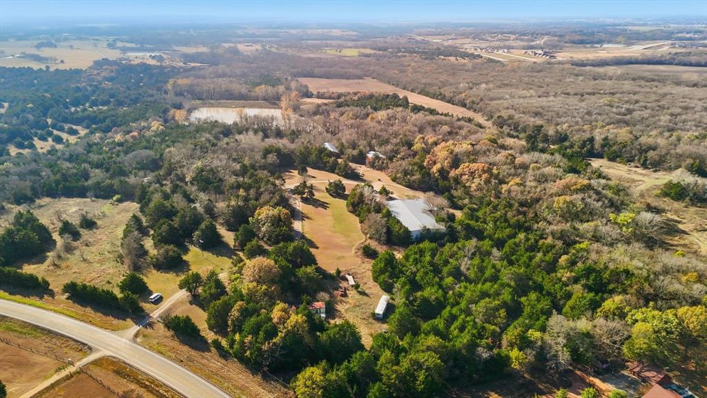 4640 Noell Road Van Alstyne, TX 75495 - Photo 7 of 34 an aerial view of residential houses with outdoor space