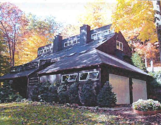 27 Topstone Road Ridgefield, CT 06877 - Photo 1 of 1 a view of a house with a yard