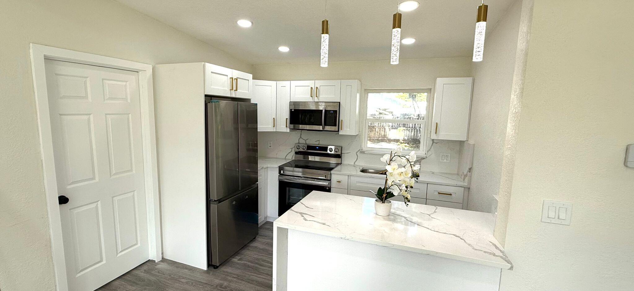 551 Oleander Road Lantana, FL 33462 - Photo 8 of 40 3cd3ad08-2056-4348-8337-7cdbe010573c