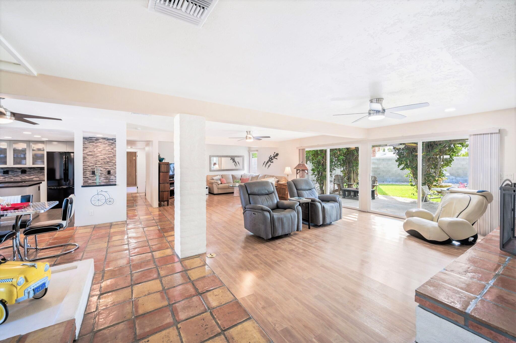71888 Vista Del Rio Rancho Mirage, CA 92270 - Photo 3 of 36 a living room with furniture and large windows