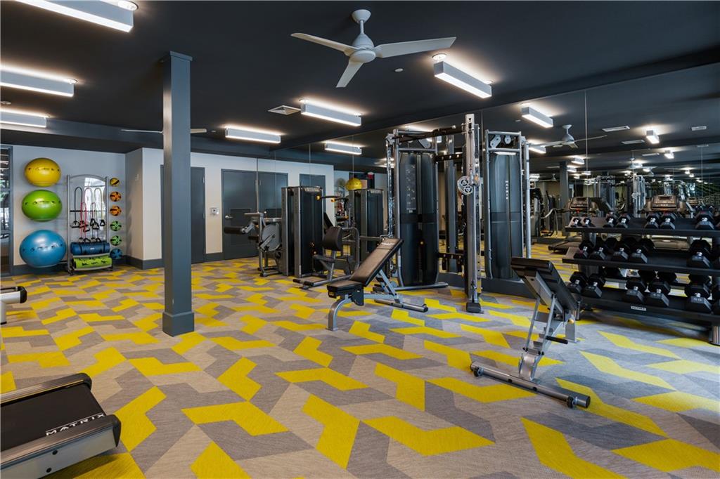 775 Juniper Street Northeast, Unit 404 Atlanta, GA 30308 - Photo 18 of 22 a view of a room with gym equipment