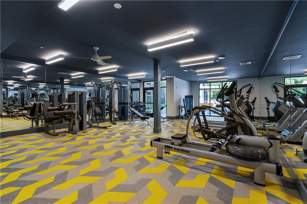 775 Juniper Street Northeast, Unit 404 Atlanta, GA 30308 - Photo 19 of 22 a view of a room with gym equipment