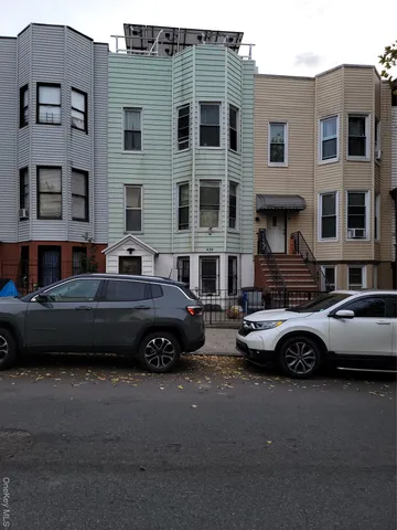 a car parked in front of a house