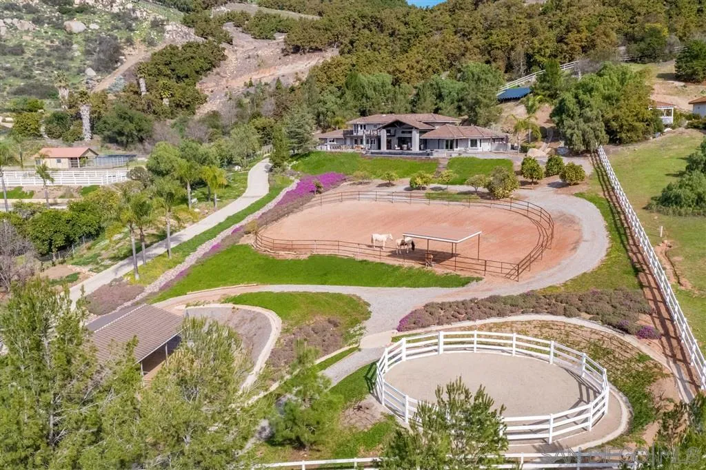 7190 Vía Mariposa Norte Bonsall, CA 92003 - Photo 21 of 25 an aerial view of a house