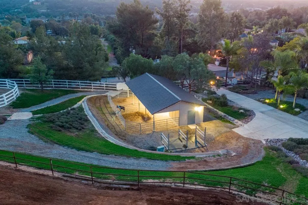 7190 Vía Mariposa Norte Bonsall, CA 92003 - Photo 24 of 25 a view of a swimming pool with a yard