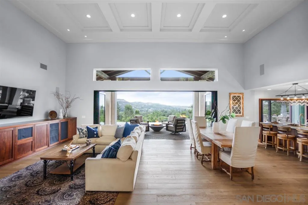 7190 Vía Mariposa Norte Bonsall, CA 92003 - Photo 6 of 25 a living room with furniture and a large window