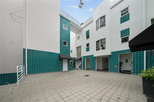a view of a house with many windows