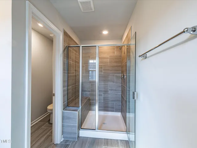 a view of a room with racks on the wall