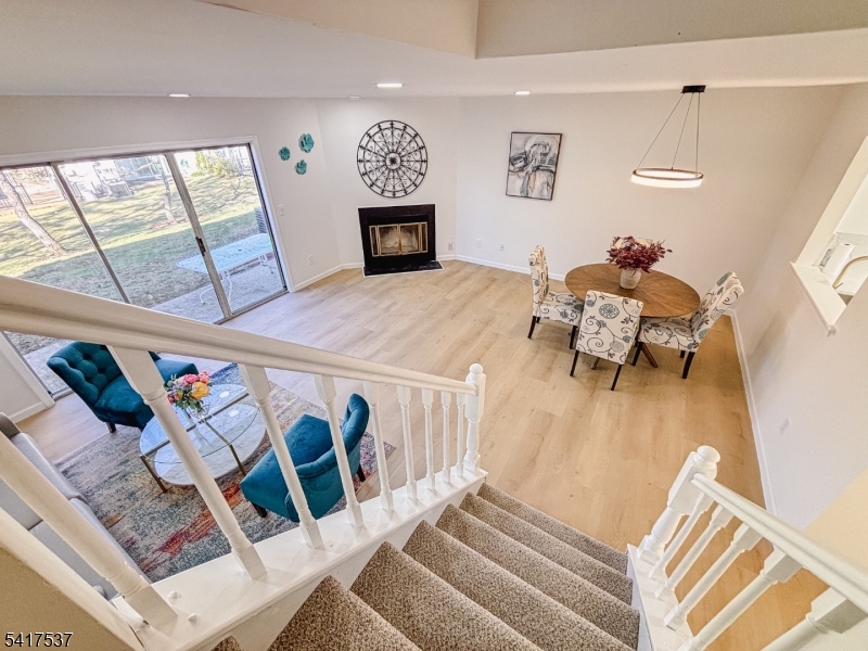 386 Inwood Court Somerset, NJ 08873 - Photo 12 of 34 a living room with furniture and a flat screen tv