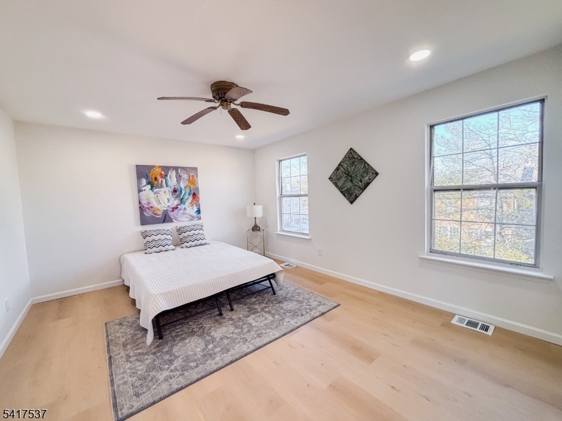 386 Inwood Court Somerset, NJ 08873 - Photo 24 of 34 a living room with furniture and a window