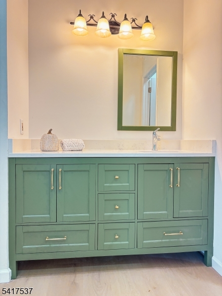 386 Inwood Court Somerset, NJ 08873 - Photo 26 of 34 a bathroom with a sink and mirror