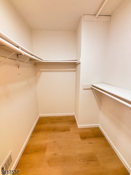 386 Inwood Court Somerset, NJ 08873 - Photo 27 of 34 a view of a room with empty racks