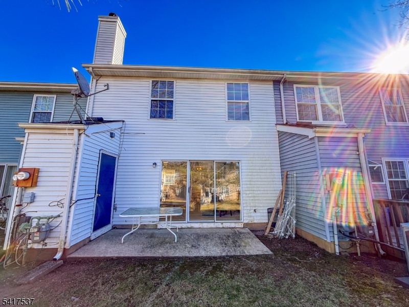 386 Inwood Court Somerset, NJ 08873 - Photo 33 of 34 a front view of a house with a yard