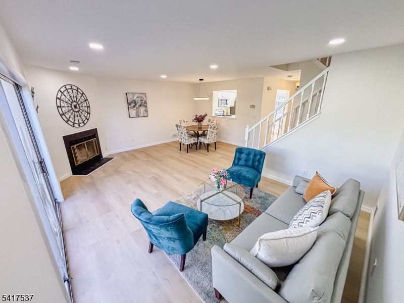 386 Inwood Court Somerset, NJ 08873 - Photo 9 of 34 a living room with furniture and wooden floor