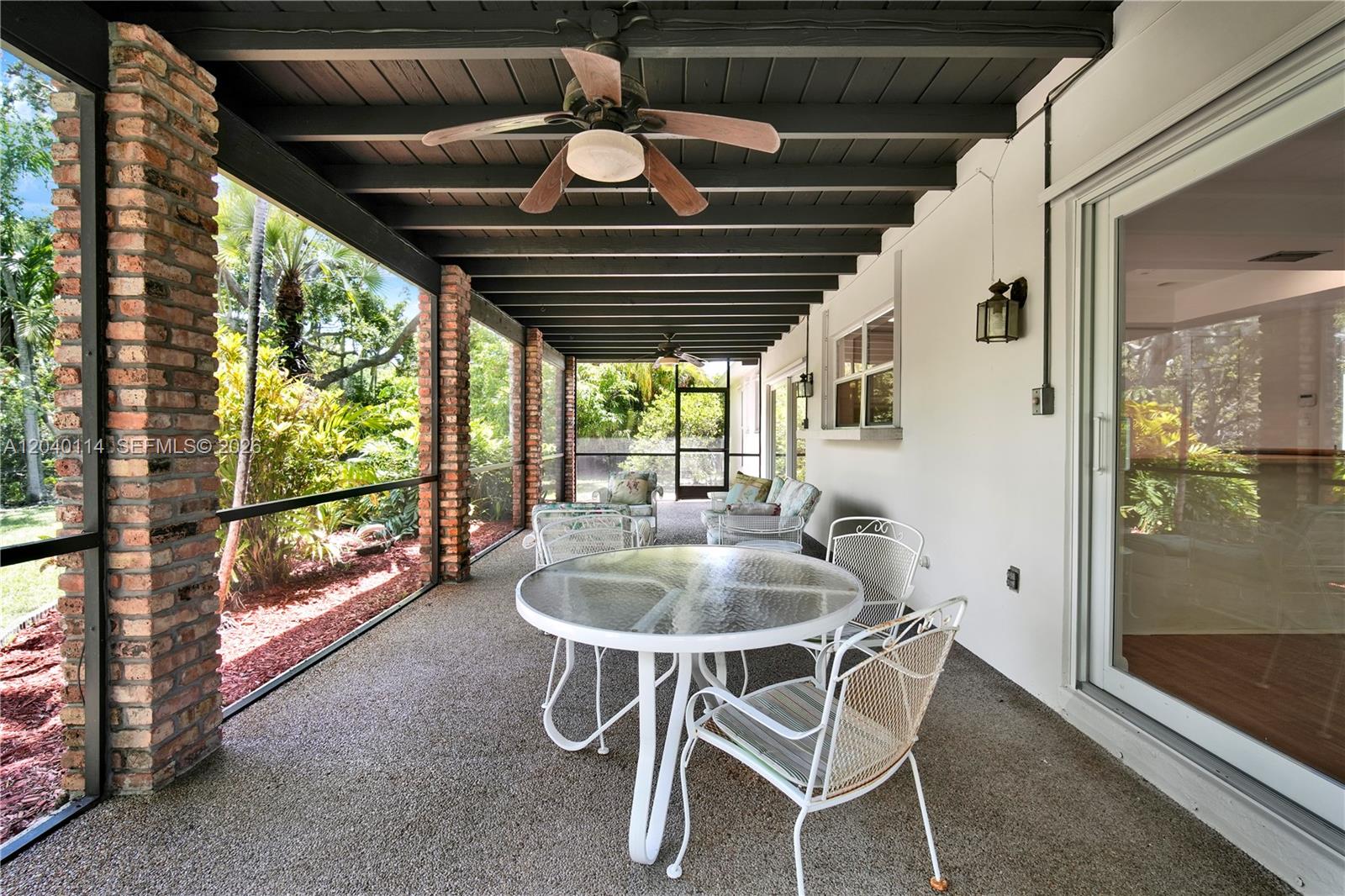 10435 Southwest 96th Street Miami, FL 33176 - Photo 29 of 44 Access to patio from living room and family room
