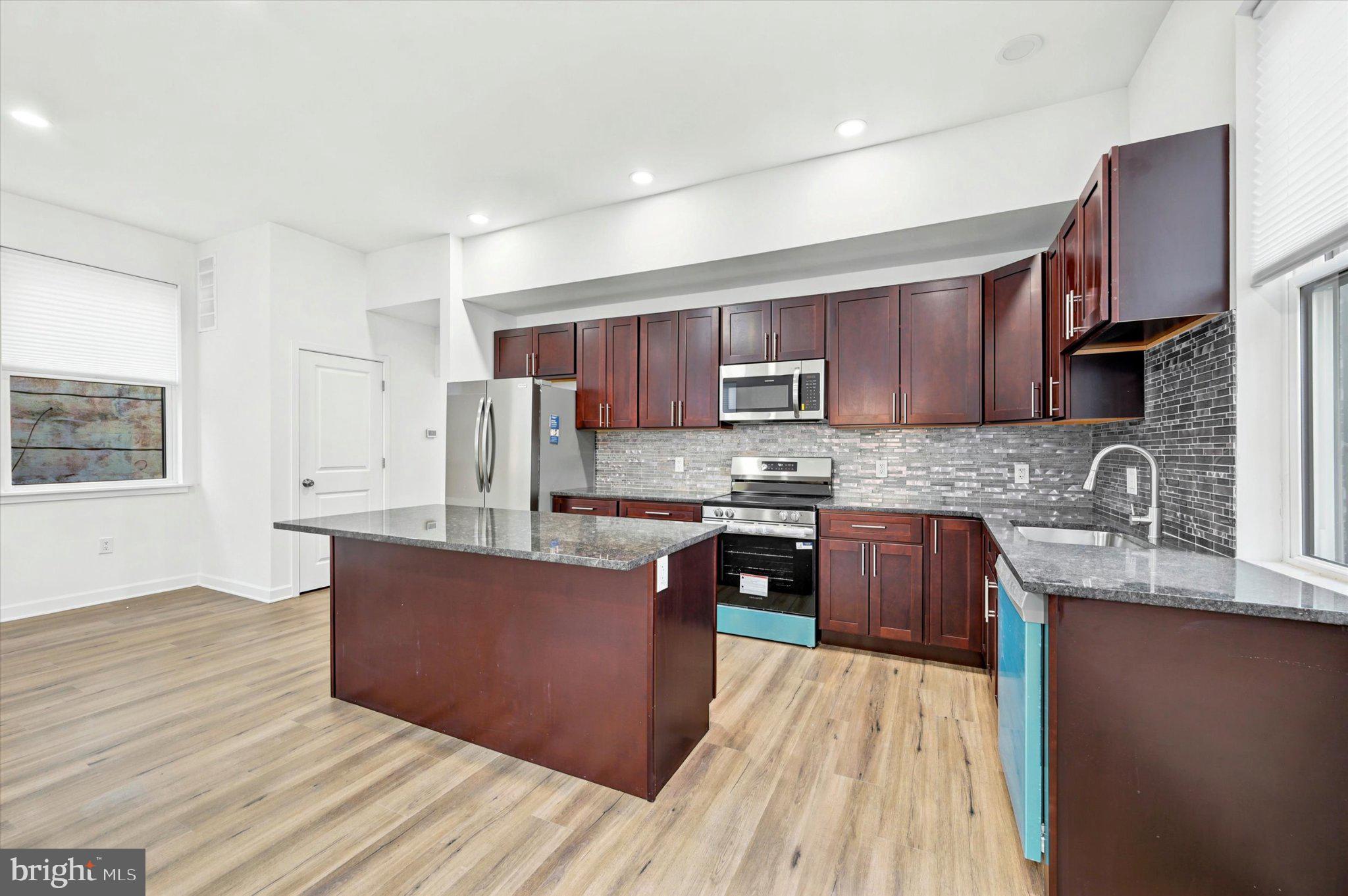 514 Ryers Avenue, Unit B Cheltenham, PA 19012 - Photo 7 of 21 Modern kitchen with sleek finishes.