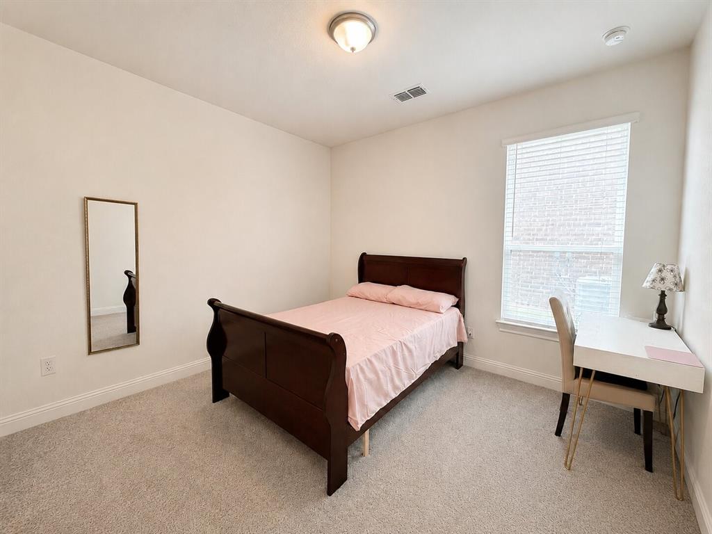3598 Furrow Road Frisco, TX 75035 - Photo 10 of 14 a bed room with a bed and a desk