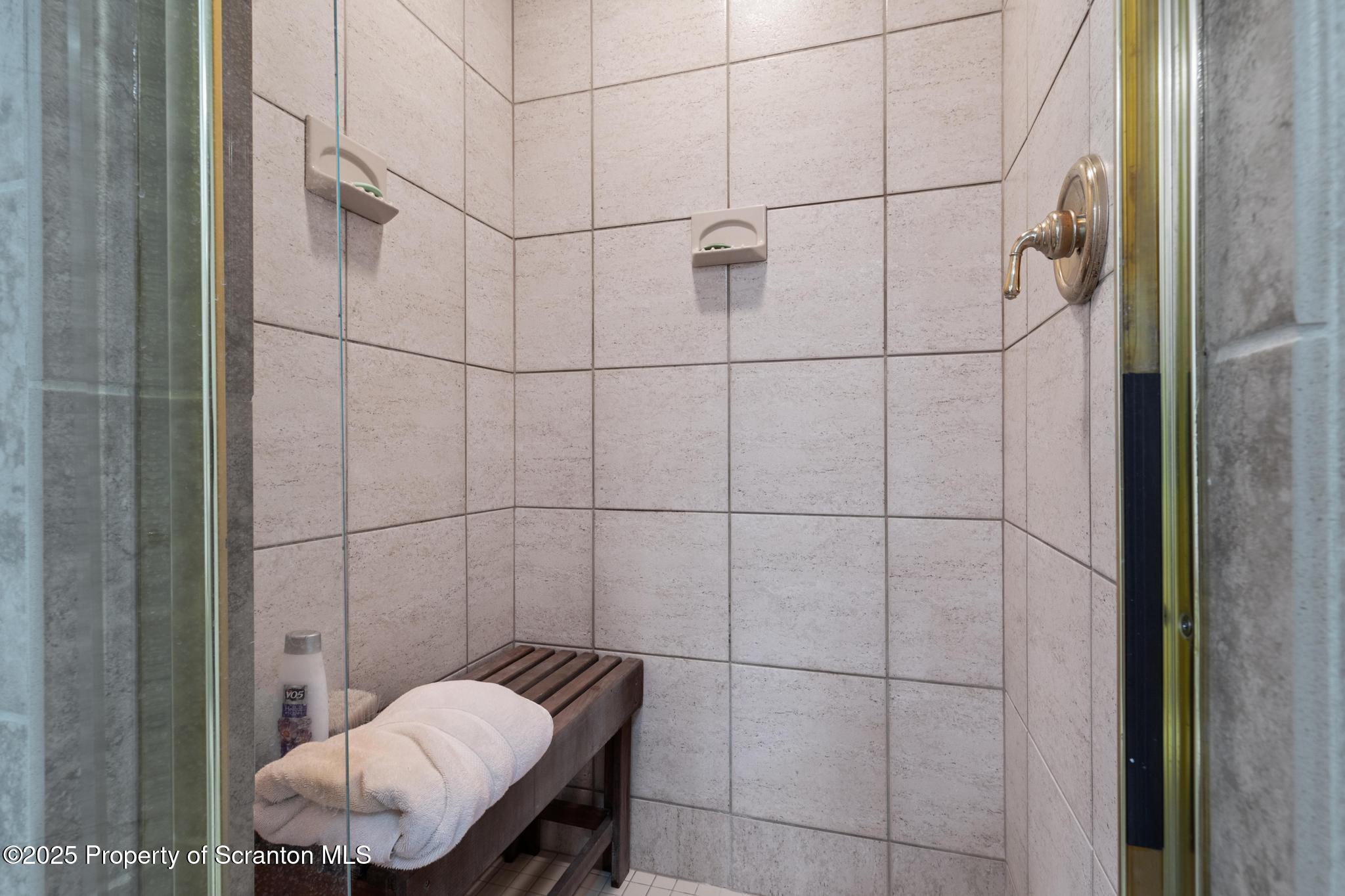 321 North Abington Road Clarks Green, PA 18411 - Photo 19 of 78 a bathroom with a sink and a shower