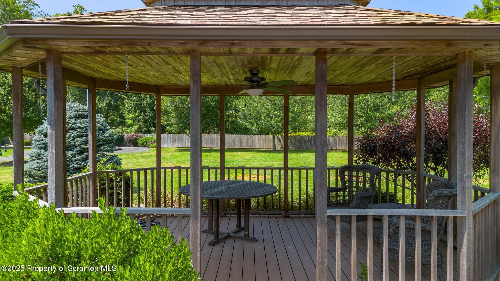 321 North Abington Road Clarks Green, PA 18411 - Photo 65 of 78 a view of a porch with a table and chairs