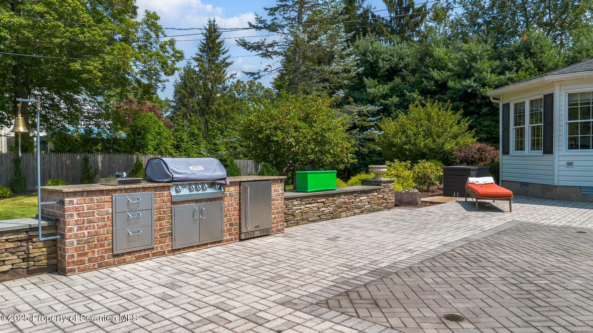 321 North Abington Road Clarks Green, PA 18411 - Photo 66 of 78 a view of a patio with a table and chairs