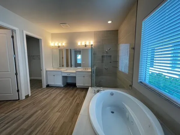 a utility room with sink dryer and washer