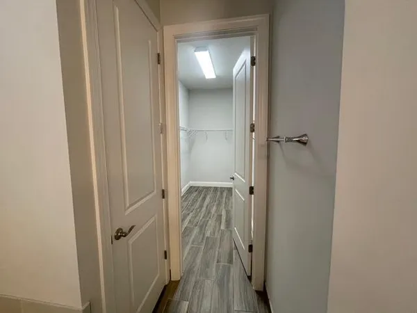 a bathroom with a sink mirror toilet and shower