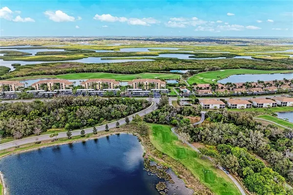 an aerial view of a house with a garden