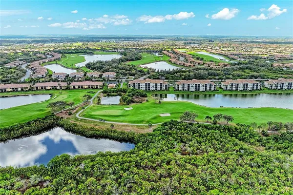 a view of a city with an ocean view